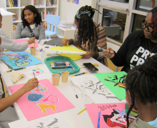 Hands-on with Graffiti painting workshop participants